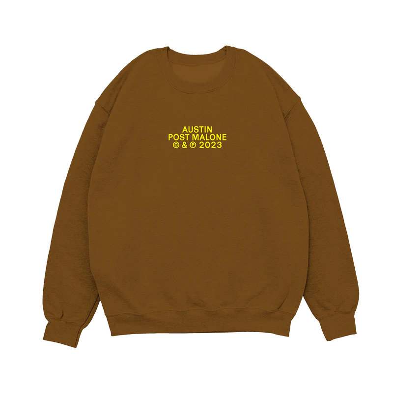 "Brown crewneck sweatshirt with text 'Austin Post Malone © & ℗ 2023' printed in yellow on the front."