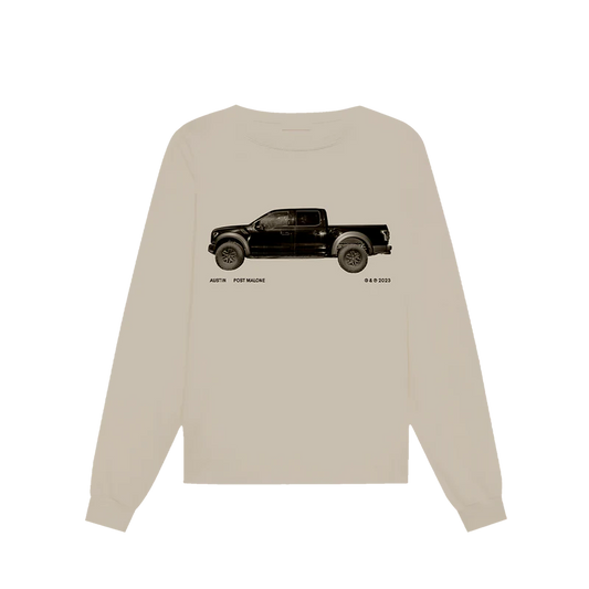 "Beige long sleeve shirt featuring a black truck graphic and 'Austin Post Malone © & ℗ 2023' printed below the image."